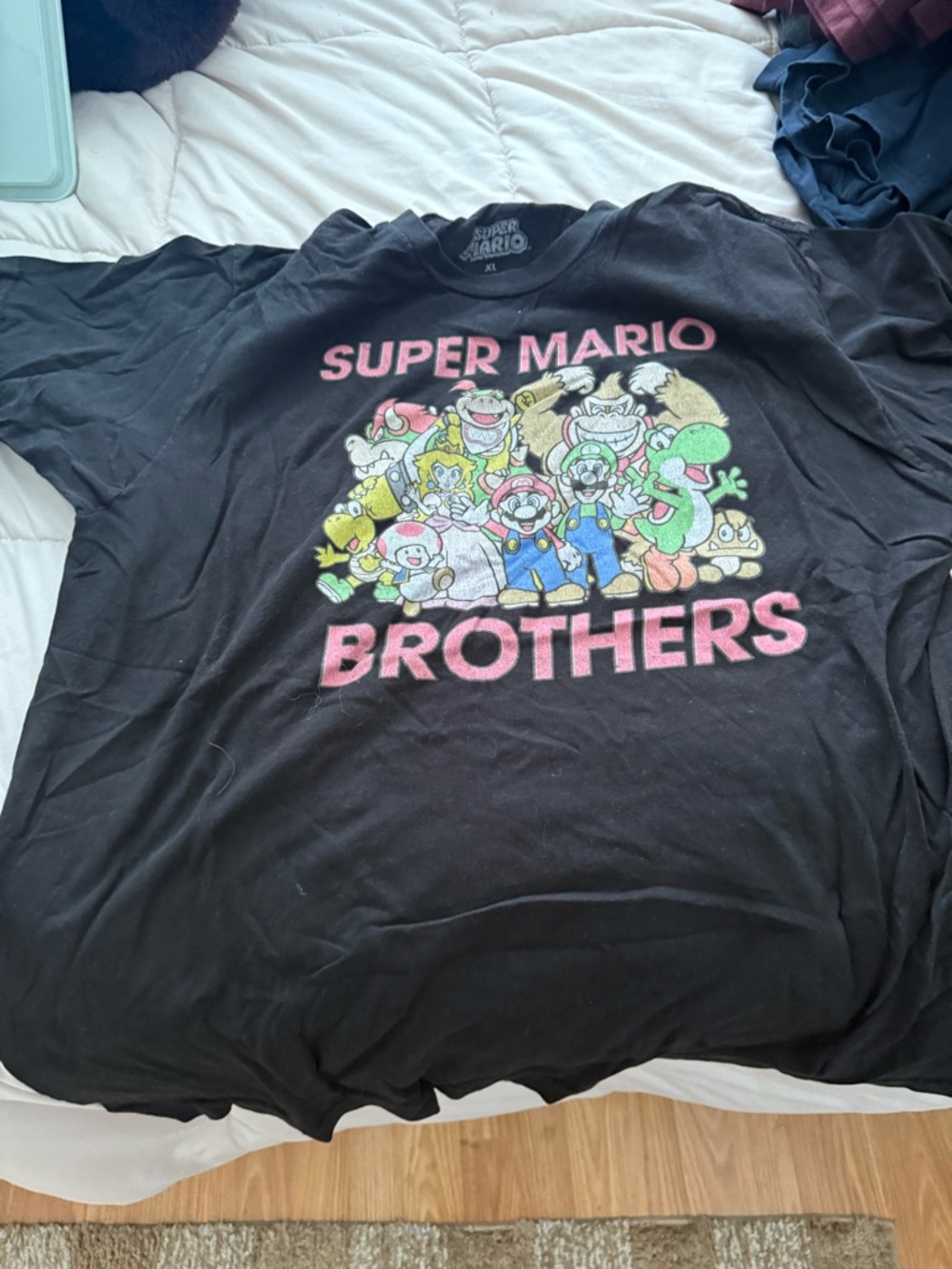 Nintendo Black T-Shirt with Pink and Multicolor Super Mario Print